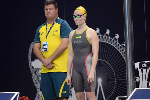 Focused: Ella Jones takes to pool deck for the first time in green and gold.