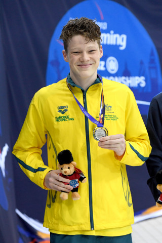 All Smiles: Popham Proudly displays his silver medal.
